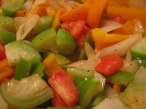 Sauteed bell and anaheim chile peppers, onions, garlic, tomatillos, and tomatoes